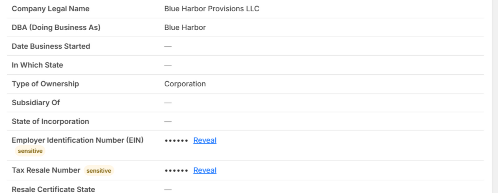 Submitted values with two sensitive fields (EIN and Tax Resale Number) masked as dots with Reveal links